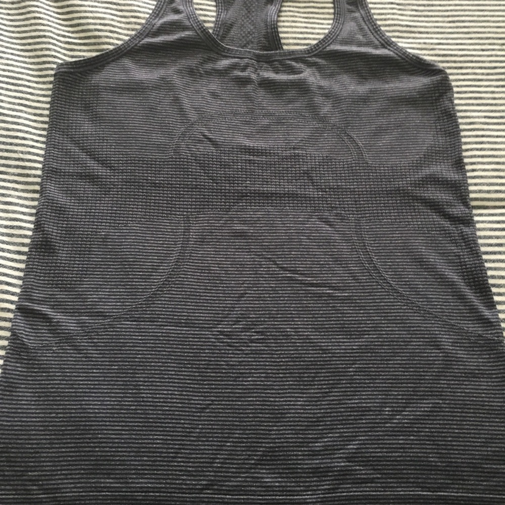 Size 8 Lululemon navy swiftly raced back tank.